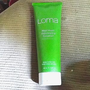 Loma maximum volume/medium to firm hold hair solution.